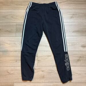 Adidas black joggers with white stripe detail and spell out logo